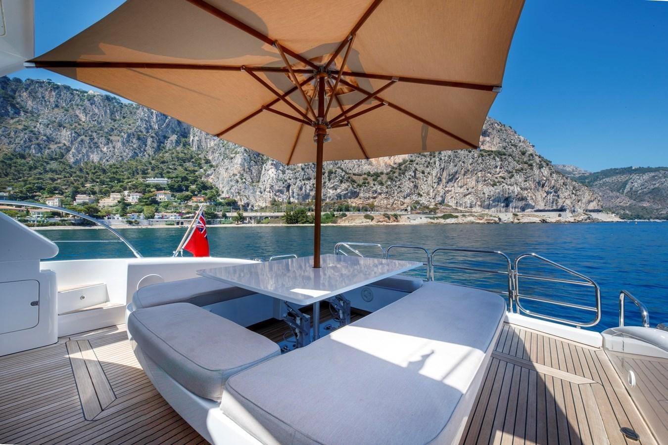 a boat on the water aboard ULTIMA BEACH Yacht for Sale
