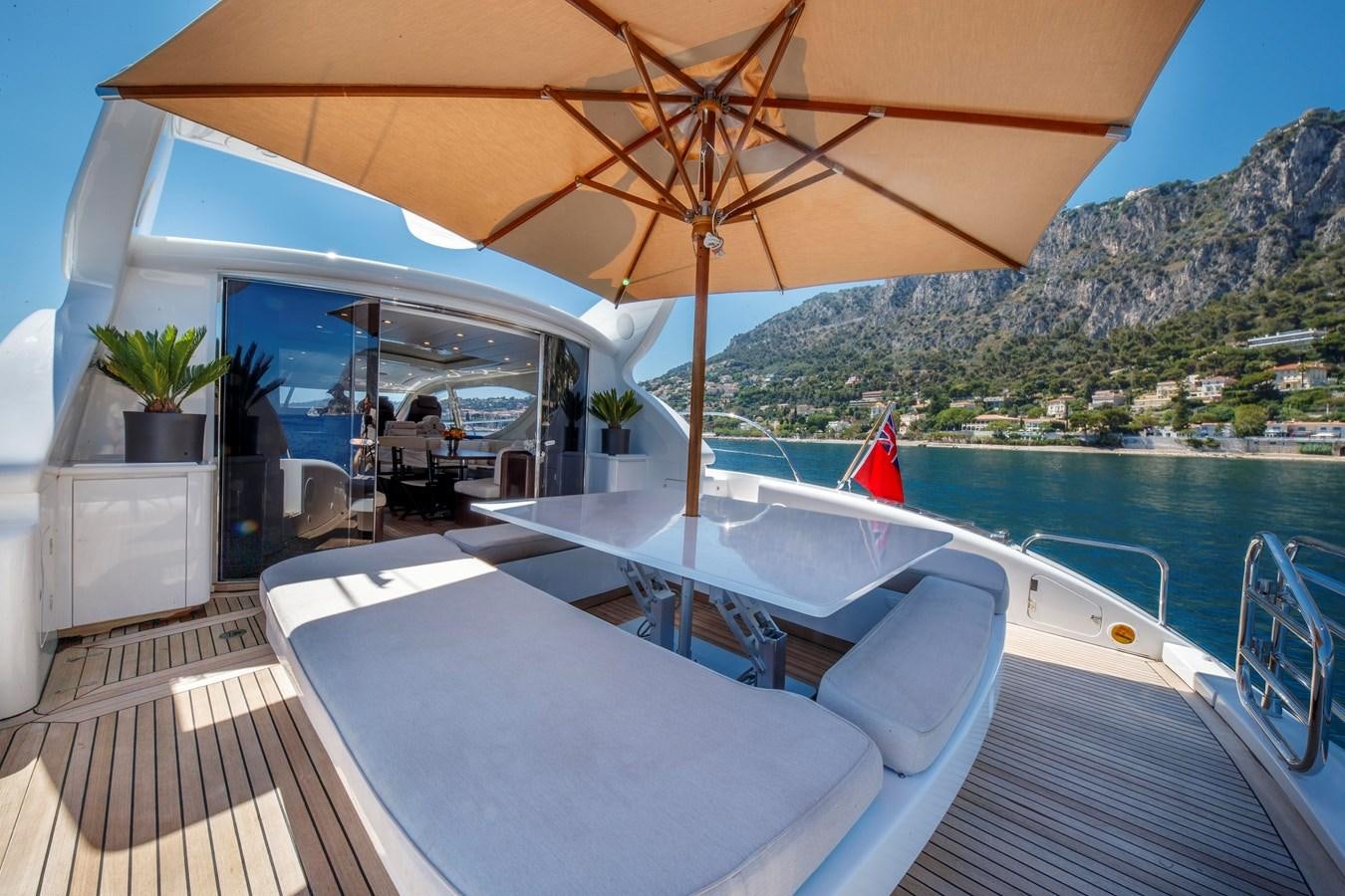 a boat on the water aboard ULTIMA BEACH Yacht for Sale