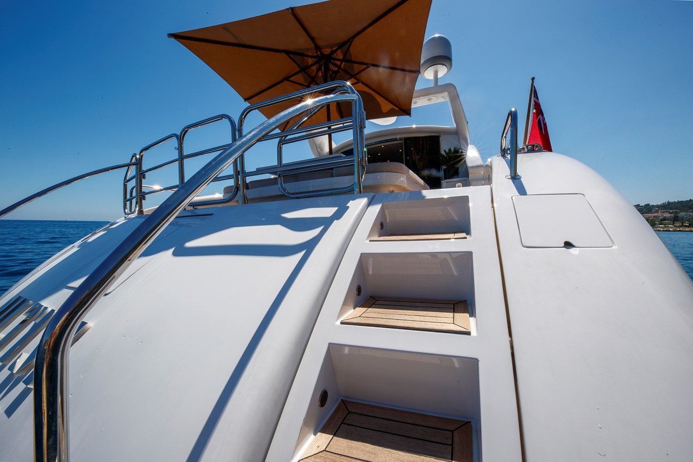a boat on the water aboard ULTIMA BEACH Yacht for Sale