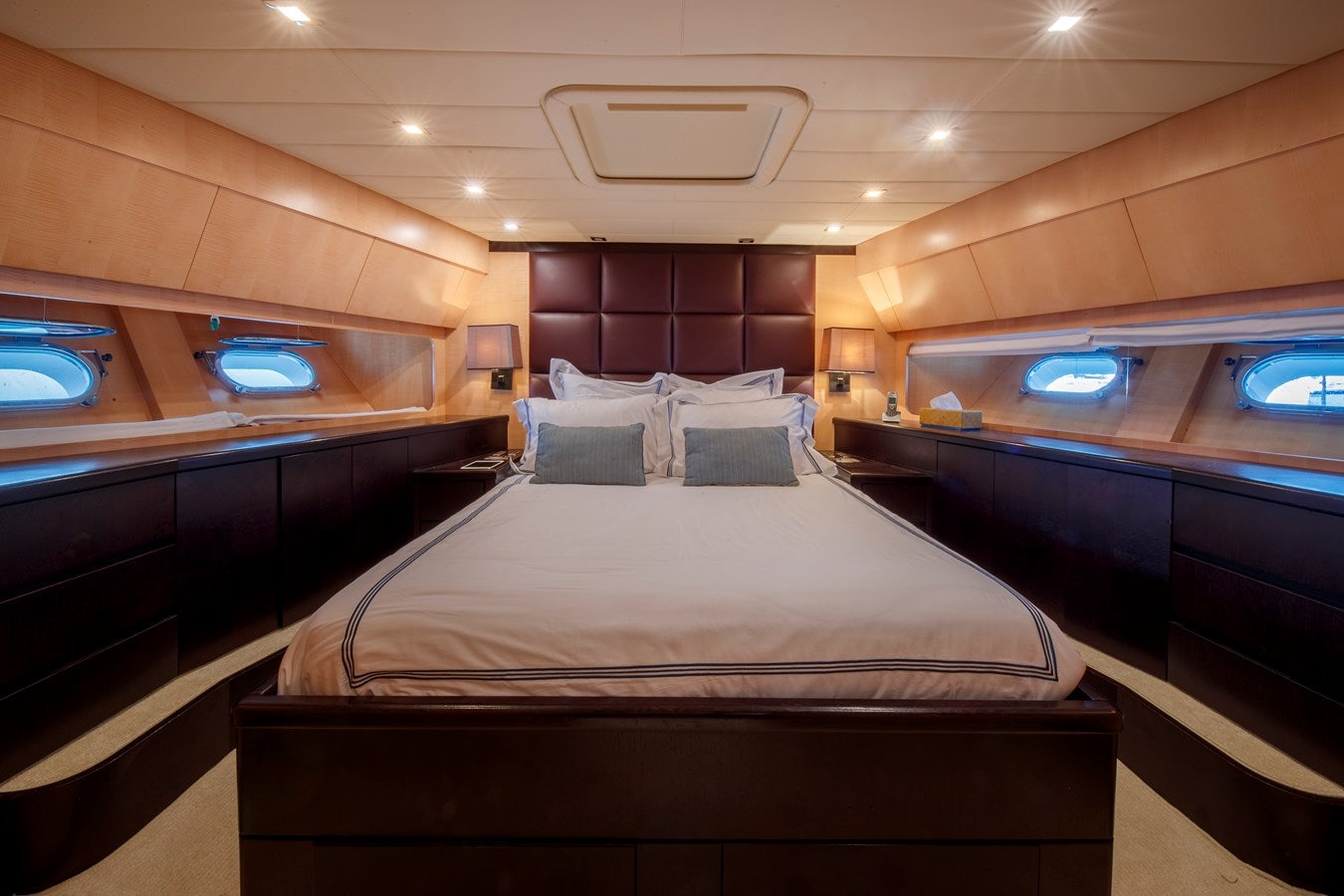a bed in a room aboard ULTIMA BEACH Yacht for Sale