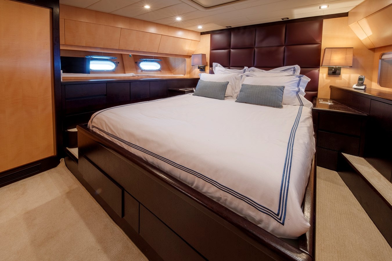 a bed in a room aboard ULTIMA BEACH Yacht for Sale