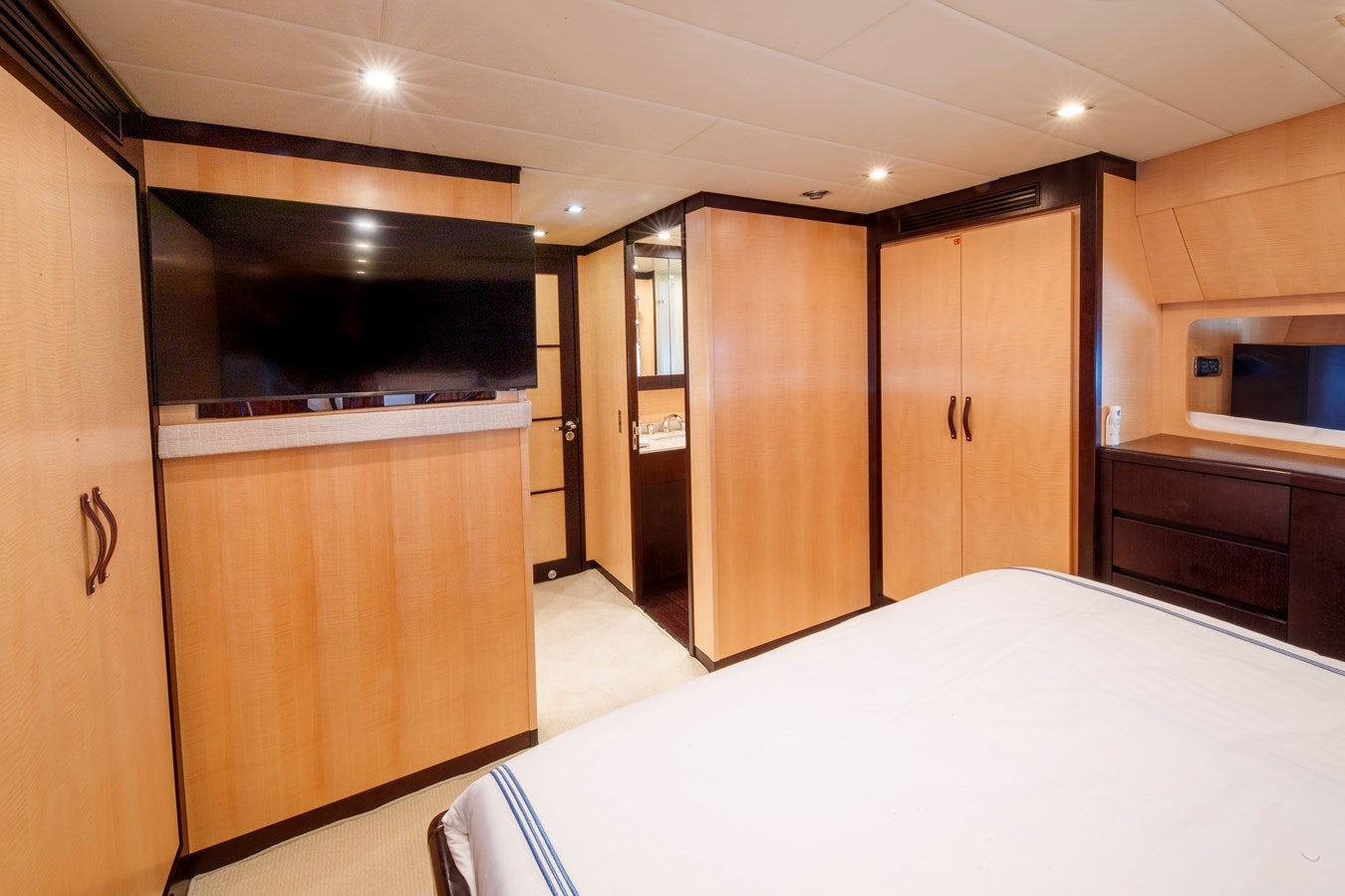 a large room with a table and cabinets aboard ULTIMA BEACH Yacht for Sale