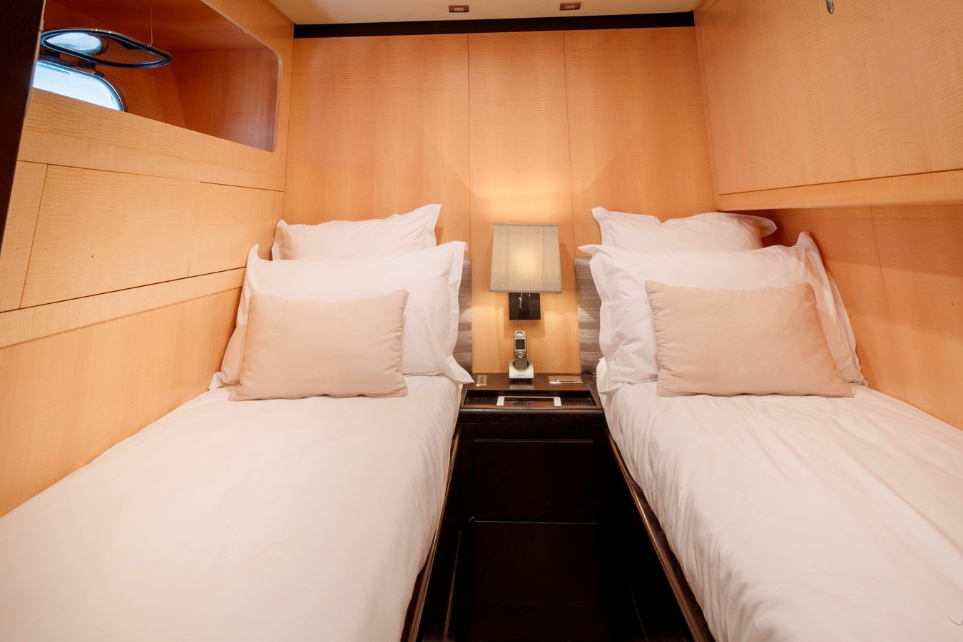 a room with two beds aboard ULTIMA BEACH Yacht for Sale