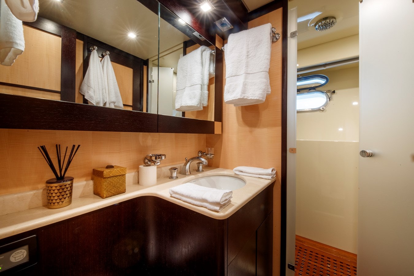 a bathroom with a large mirror aboard ULTIMA BEACH Yacht for Sale
