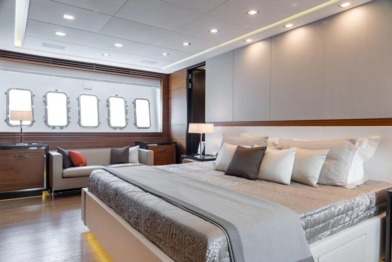a hotel room with a bed and a couch aboard ASYA Yacht for Sale