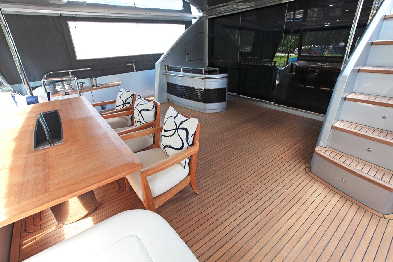 a room with a table and chairs aboard SEABEACH Yacht for Sale