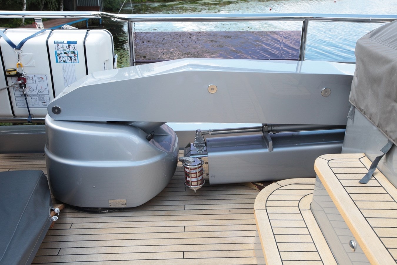 a white toilet sits on a wooden deck aboard SEABEACH Yacht for Sale