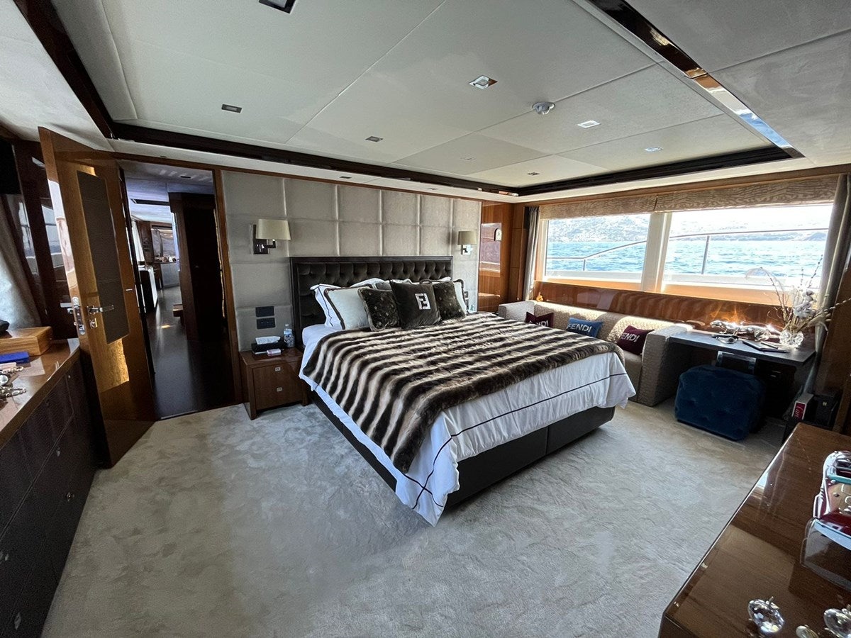 a bedroom with a large bed aboard SEABEACH Yacht for Sale