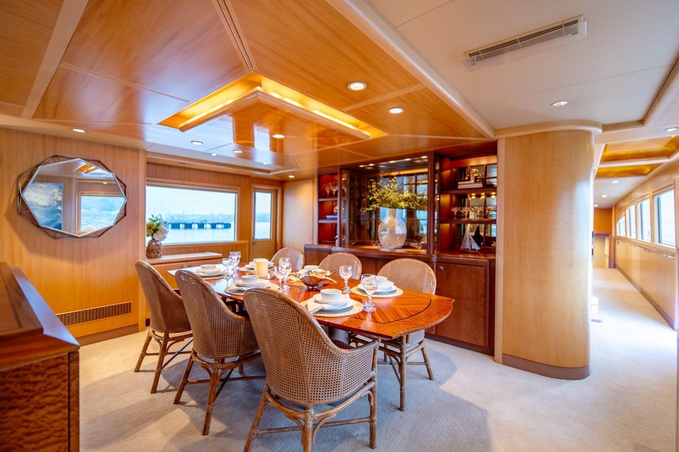 a dining room with a table and chairs aboard SHADOWFAX Yacht for Sale