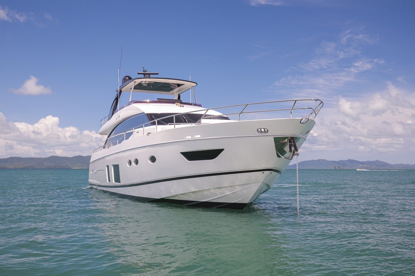 a white boat in the water aboard SE1 Yacht for Sale