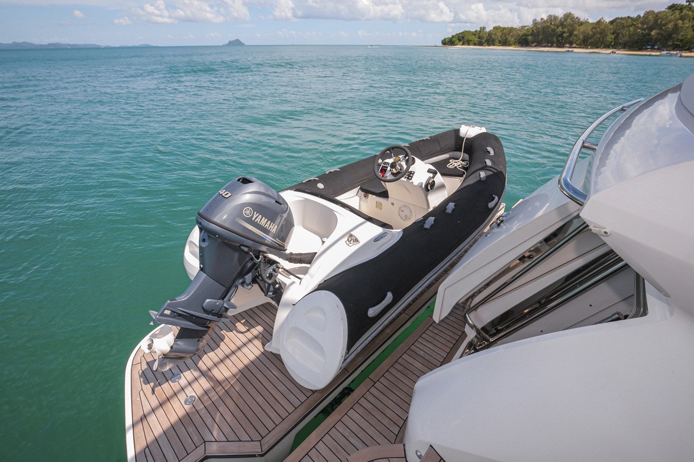 a military vehicle on a boat aboard SE1 Yacht for Sale