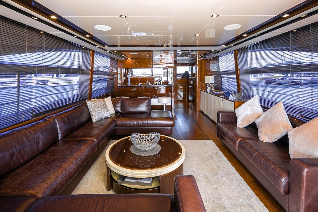 a living room with leather couches aboard SE1 Yacht for Sale