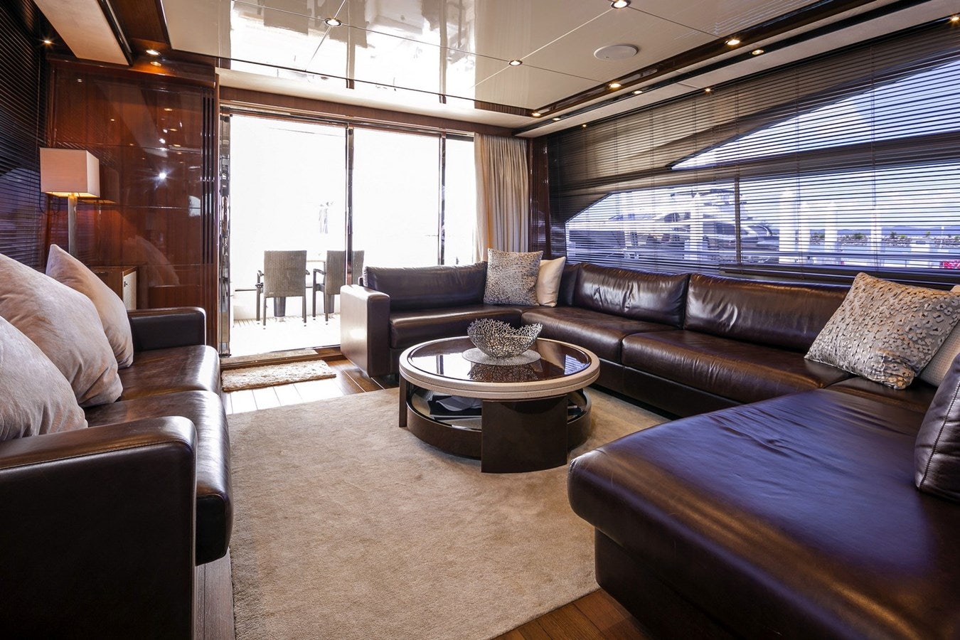 a living room with leather couches aboard SE1 Yacht for Sale