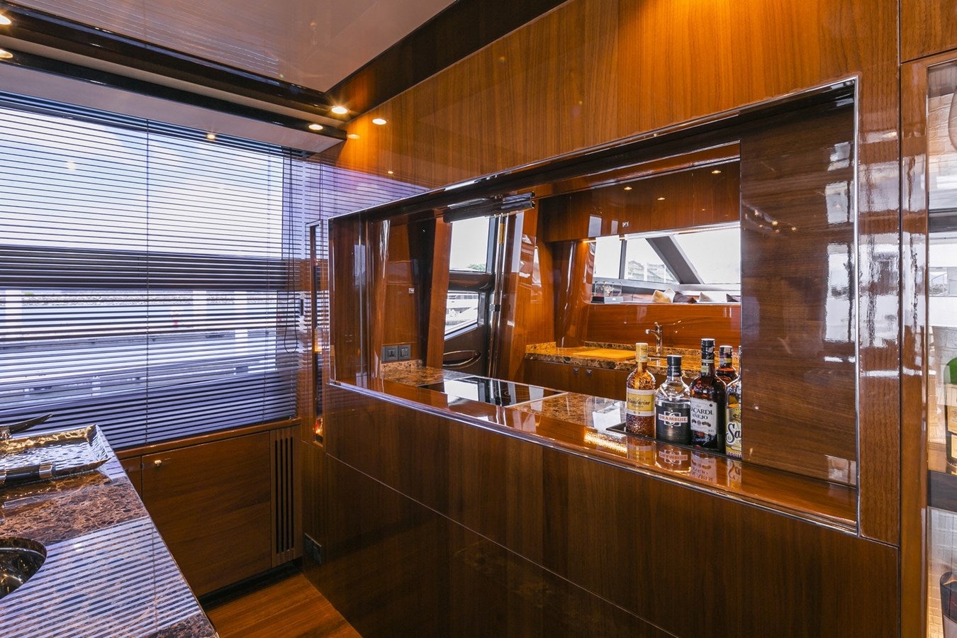 a bar with a few bottles of beer on it aboard SE1 Yacht for Sale