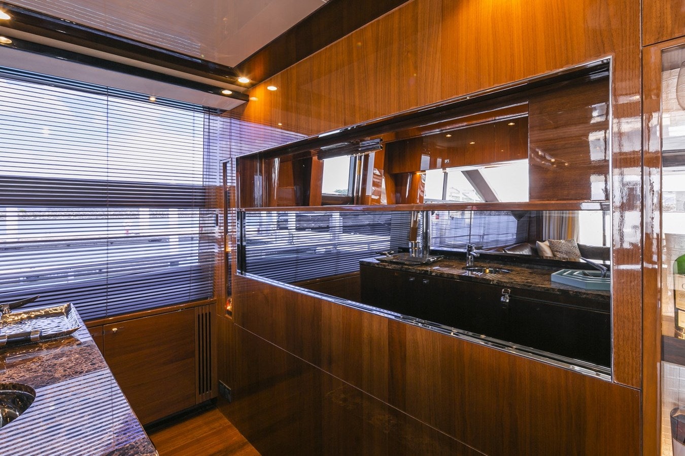 a kitchen with a large mirror aboard SE1 Yacht for Sale