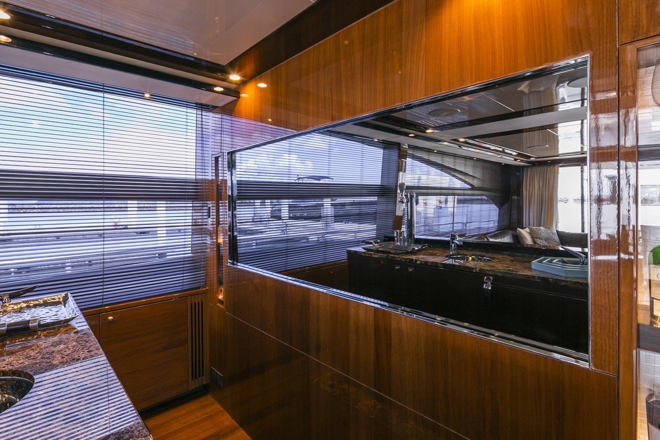 a kitchen with a large glass window aboard SE1 Yacht for Sale