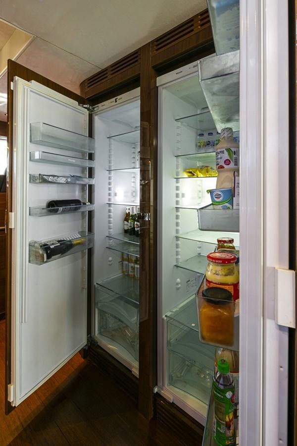 a refrigerator with its doors open aboard SE1 Yacht for Sale
