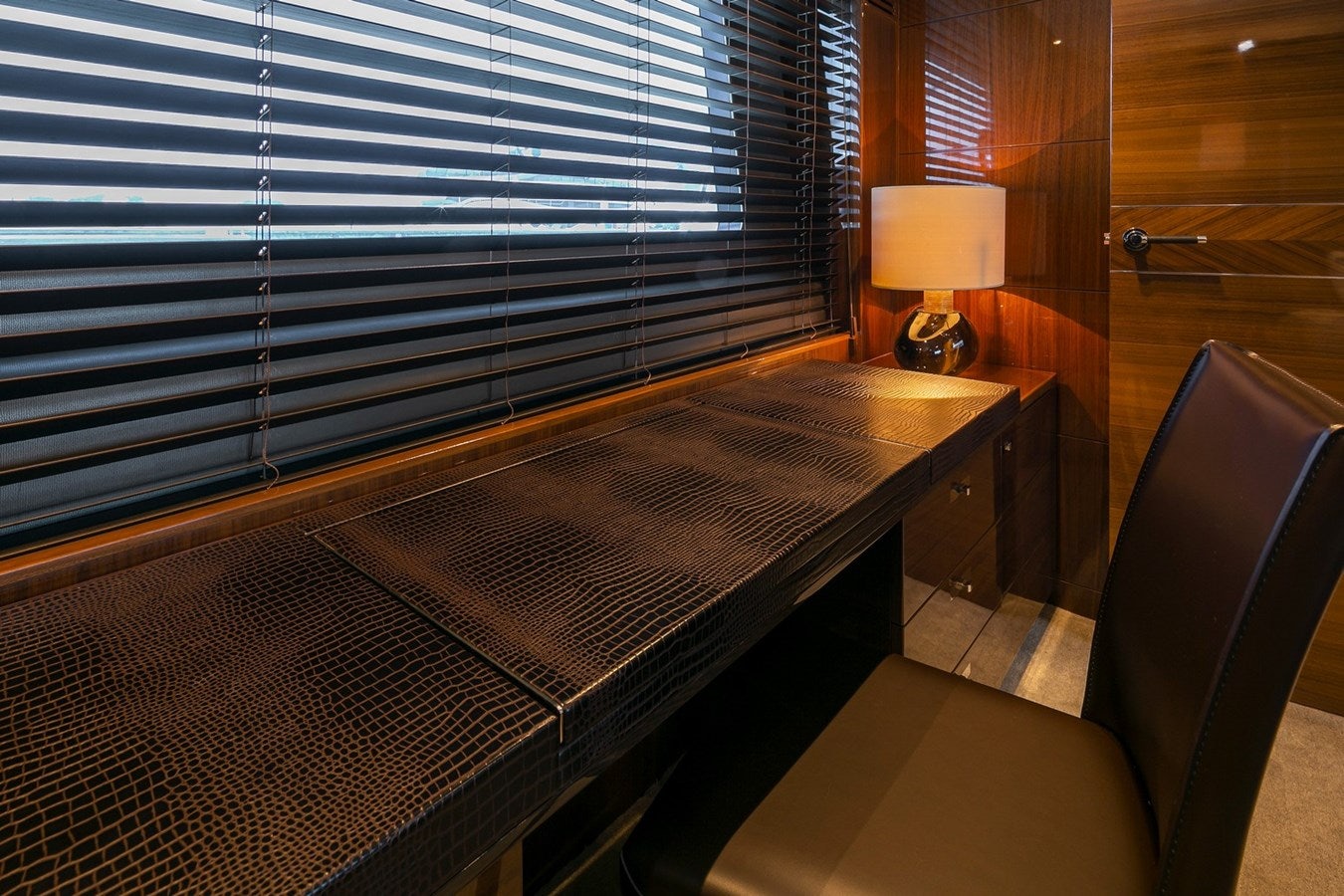 a room with a lamp and a bed aboard SE1 Yacht for Sale