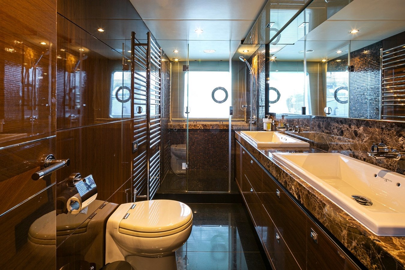 a bathroom with a tub sink and toilet aboard SE1 Yacht for Sale