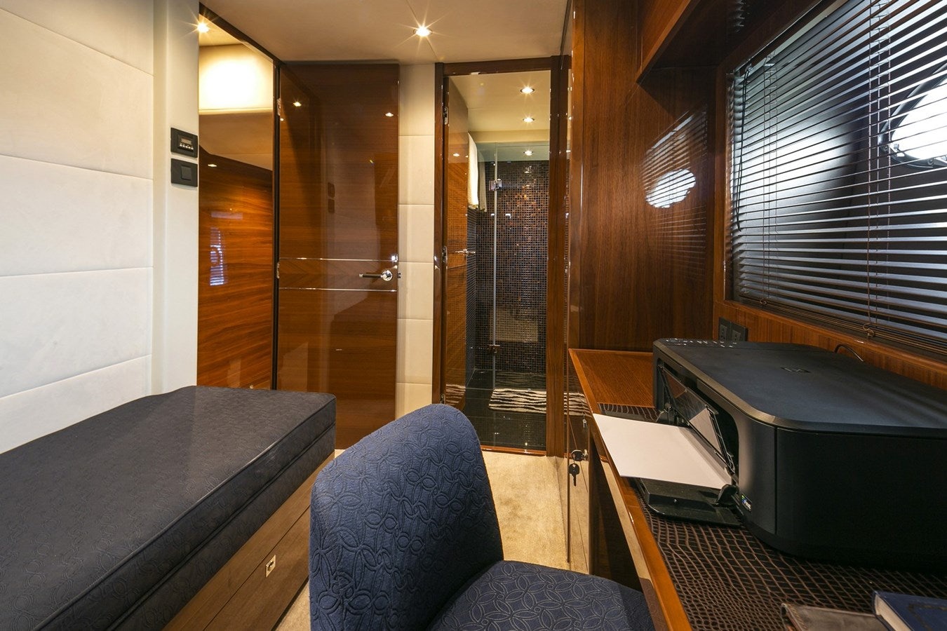 a room with a table and chairs aboard SE1 Yacht for Sale