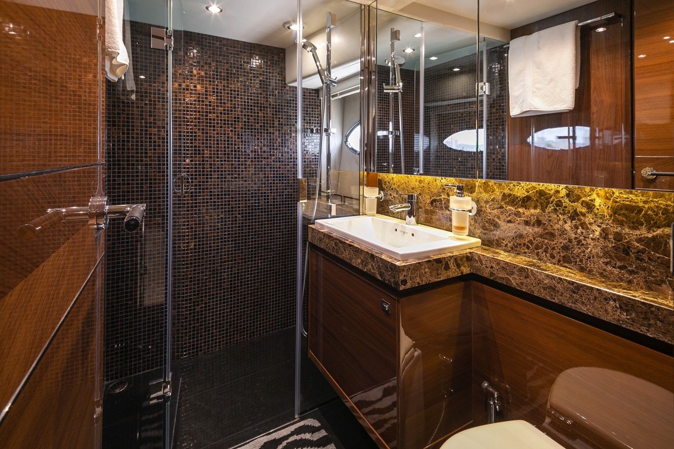 a bathroom with a shower and sink aboard SE1 Yacht for Sale