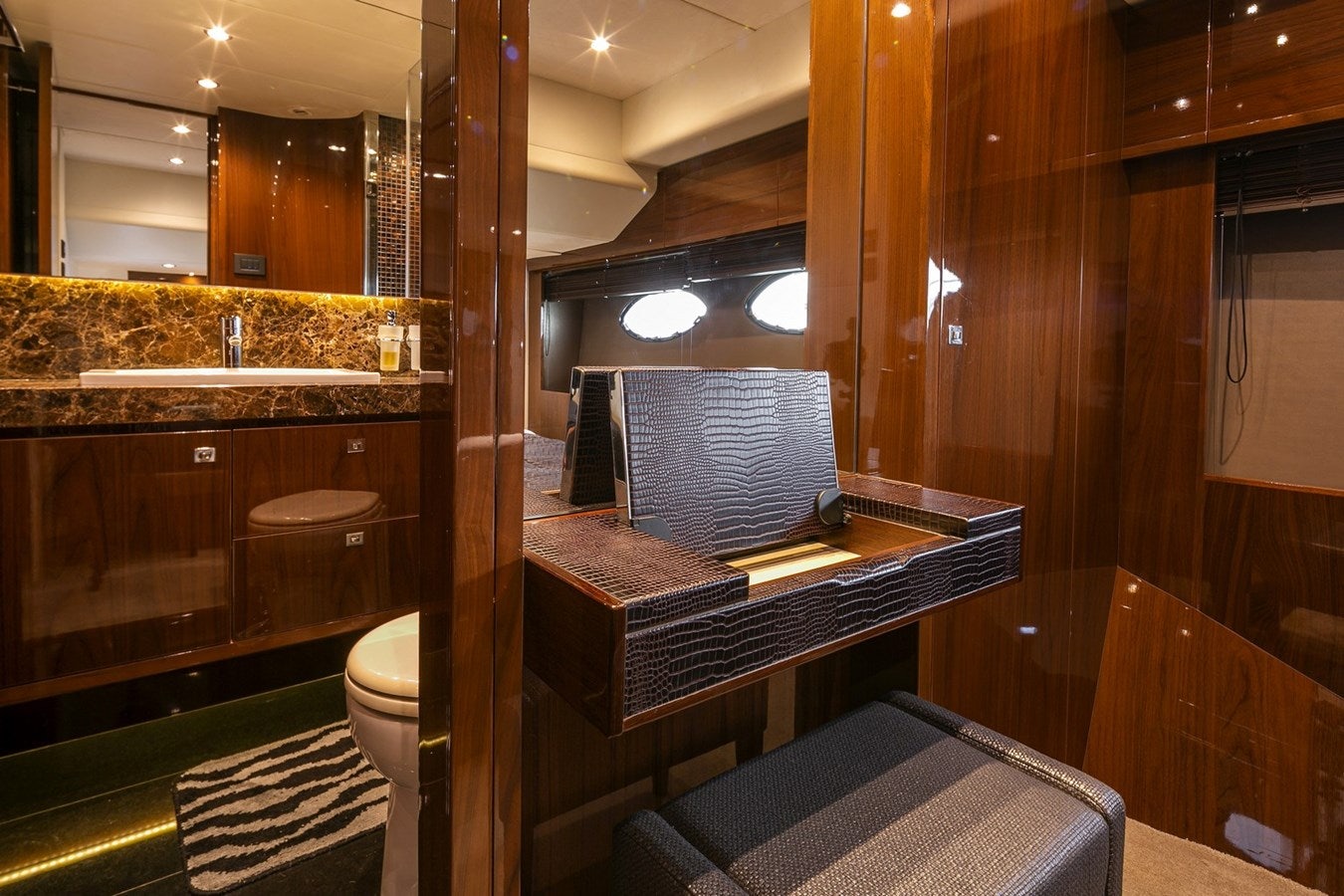 a bathroom with a sink and a mirror aboard SE1 Yacht for Sale