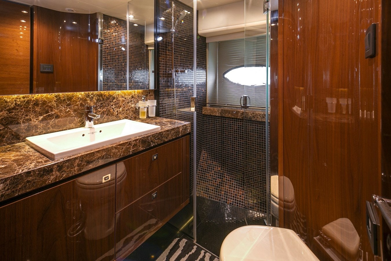 a bathroom with a sink and a shower aboard SE1 Yacht for Sale