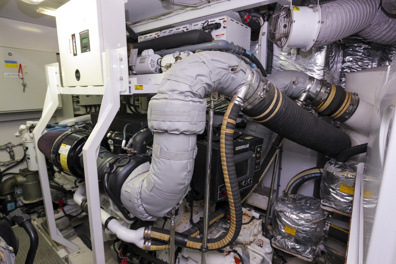 a person working on a machine aboard SE1 Yacht for Sale