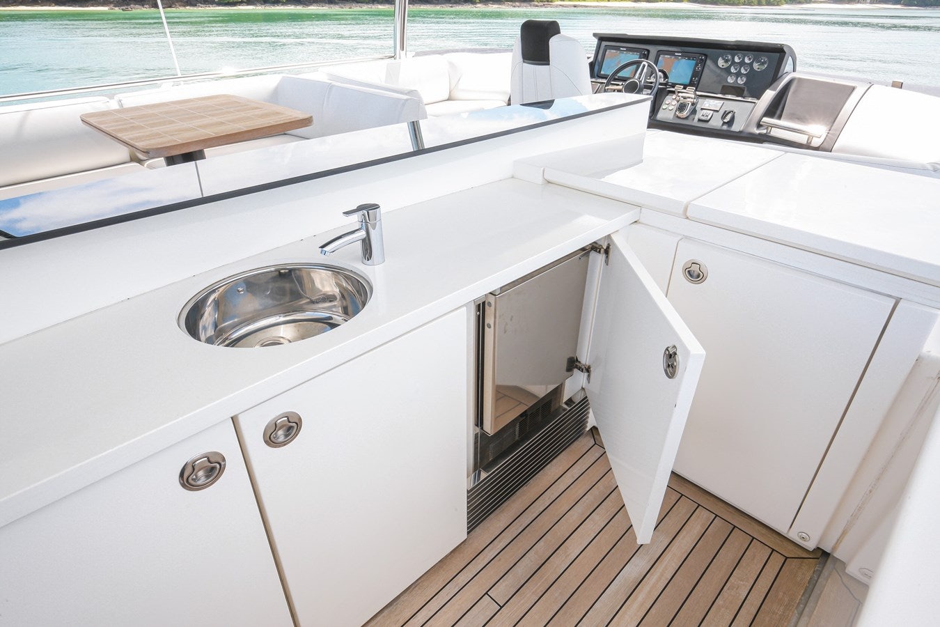 a kitchen sink with a wooden countertop aboard SE1 Yacht for Sale