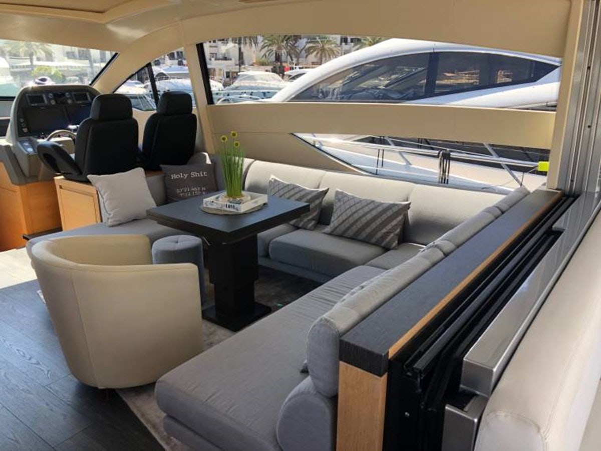 inside of a car aboard HOLY SHIT Yacht for Sale