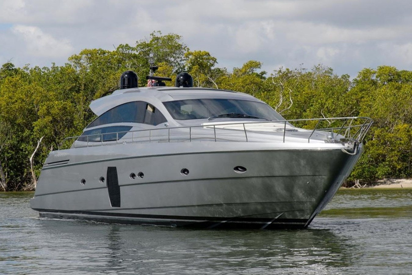 a white yacht in the water aboard HOLY SHIT Yacht for Sale