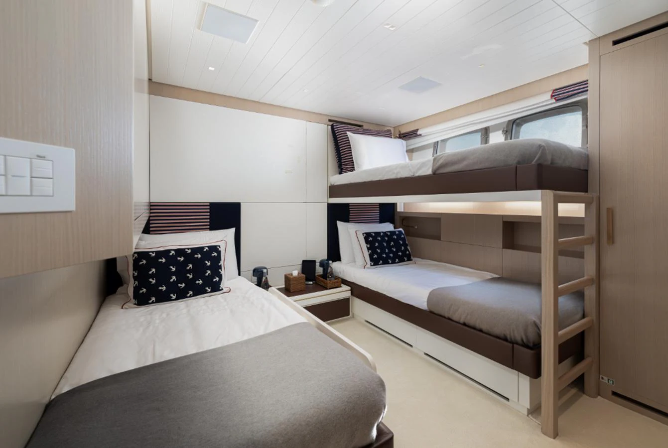 a room with two beds aboard THE GREAT ESCAPE Yacht for Sale