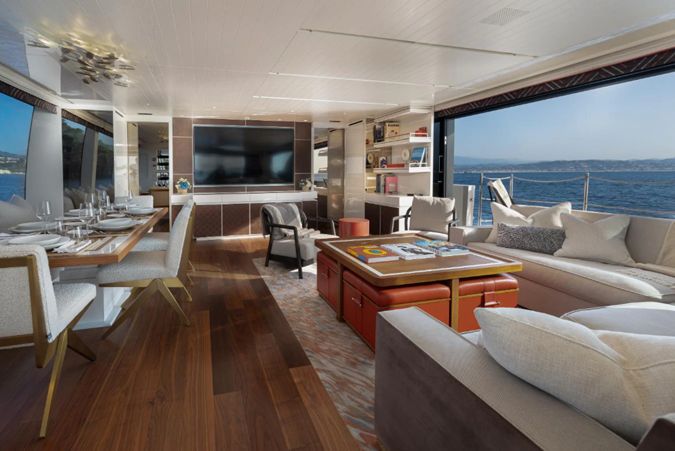 a living room with a wood floor aboard THE GREAT ESCAPE Yacht for Sale