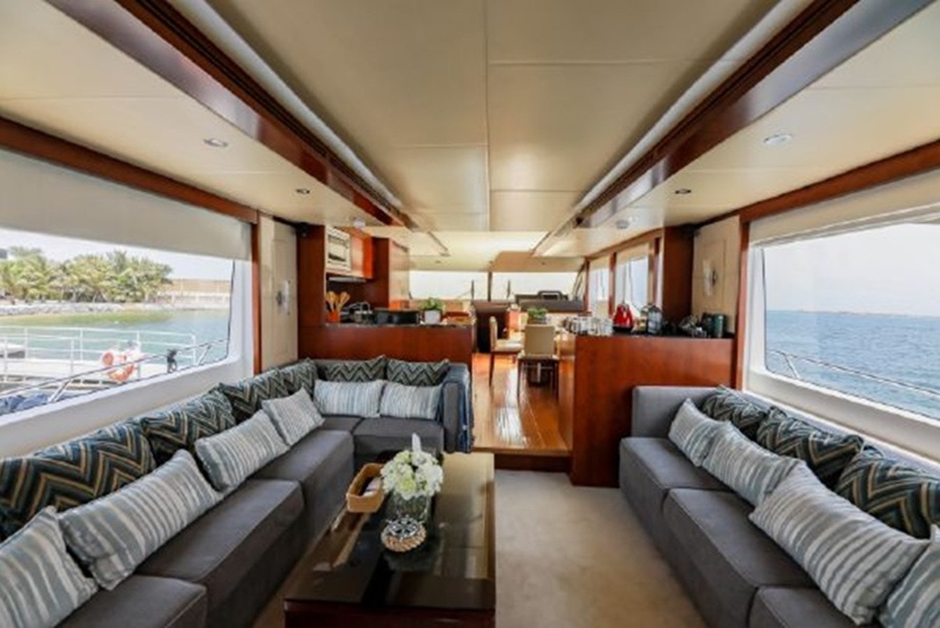 a living room with a large window aboard MAJESTY 70 Yacht for Sale