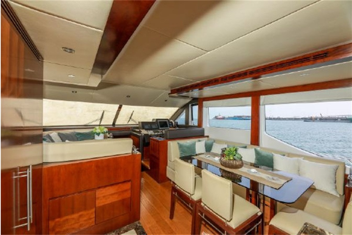 a boat with a table and chairs aboard MAJESTY 70 Yacht for Sale