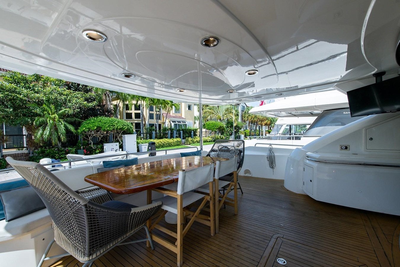 a large white tent with tables and chairs and a large white tent aboard 82 SUNSEEKER MANHATTAN  Yacht for Sale
