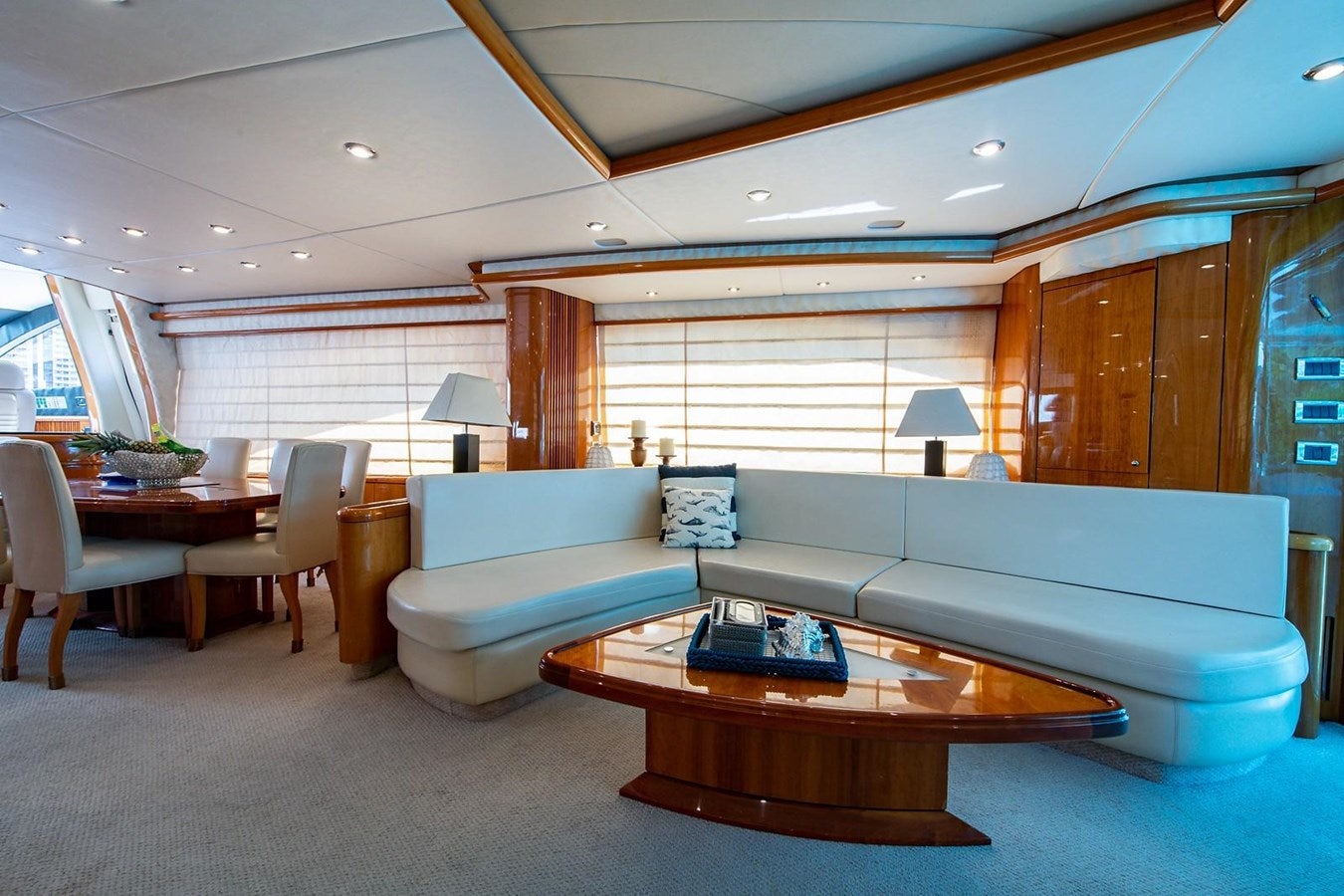 a living room with a couch and a coffee table aboard 82 SUNSEEKER MANHATTAN  Yacht for Sale