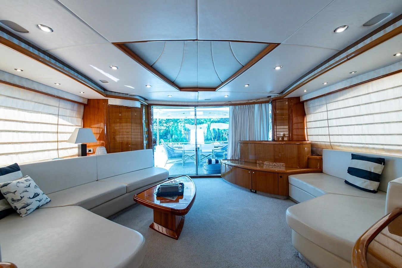 a living room with a large open window aboard 82 SUNSEEKER MANHATTAN  Yacht for Sale
