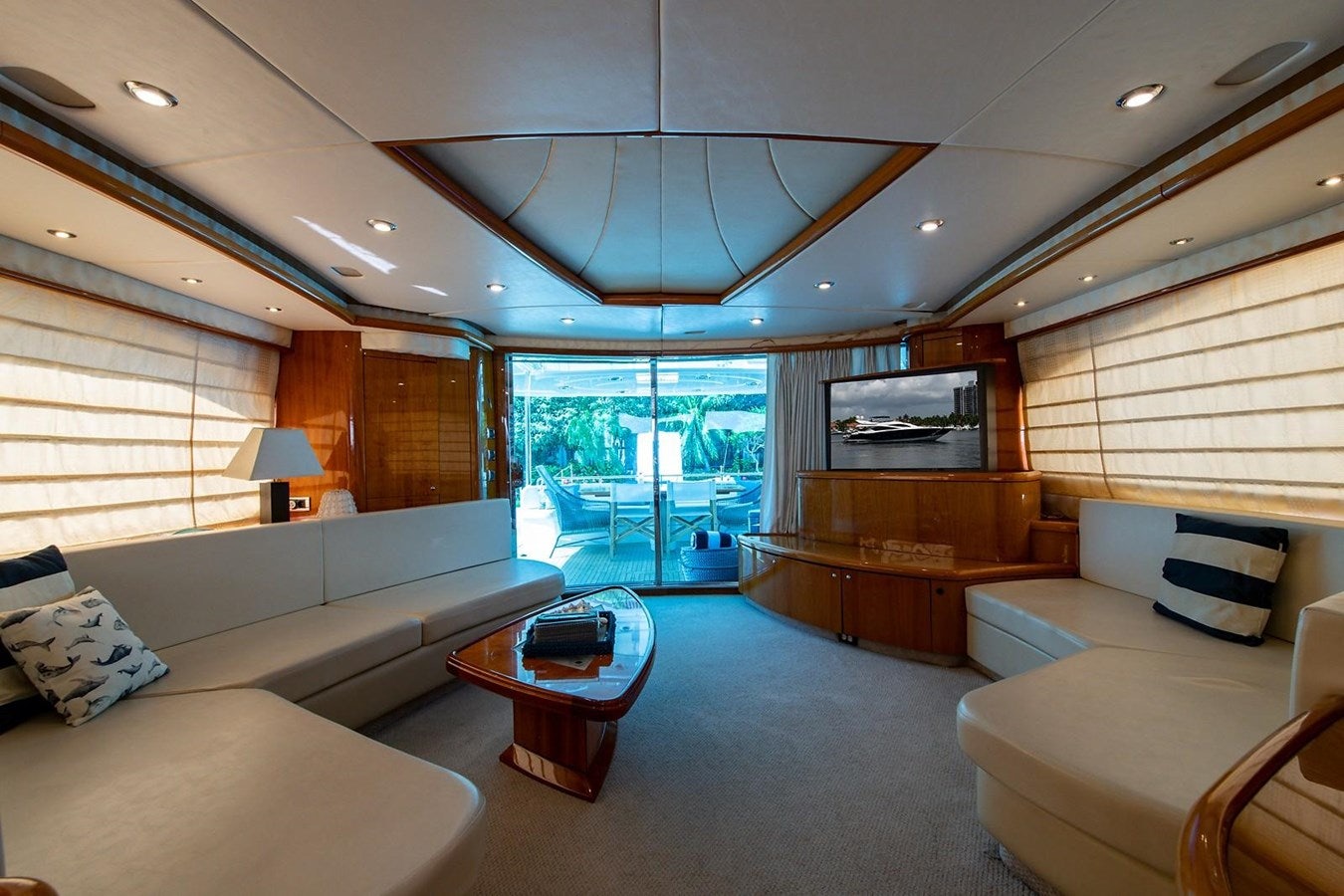 a living room with a large window aboard 82 SUNSEEKER MANHATTAN  Yacht for Sale