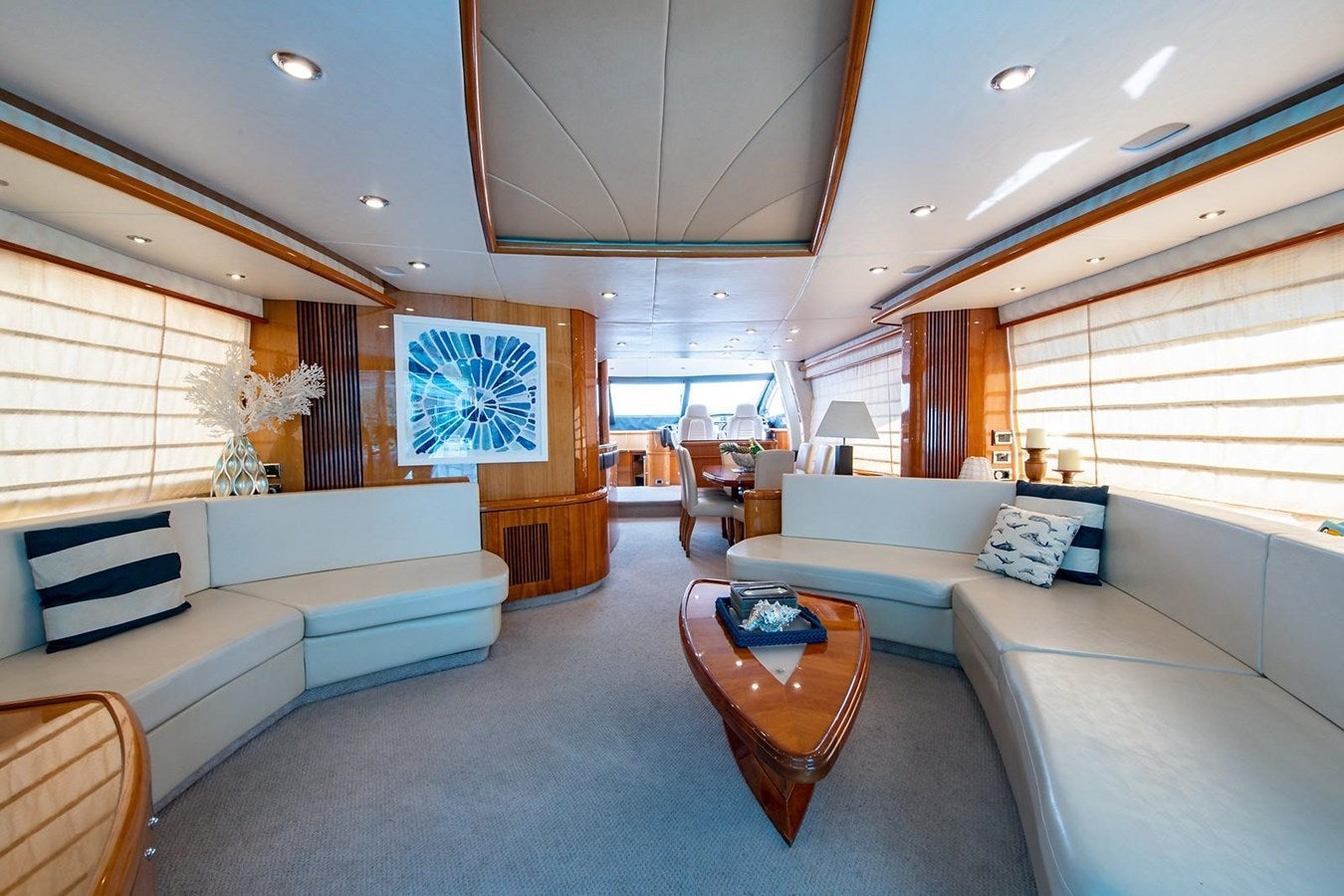 a living room with a couch and a coffee table aboard 82 SUNSEEKER MANHATTAN  Yacht for Sale