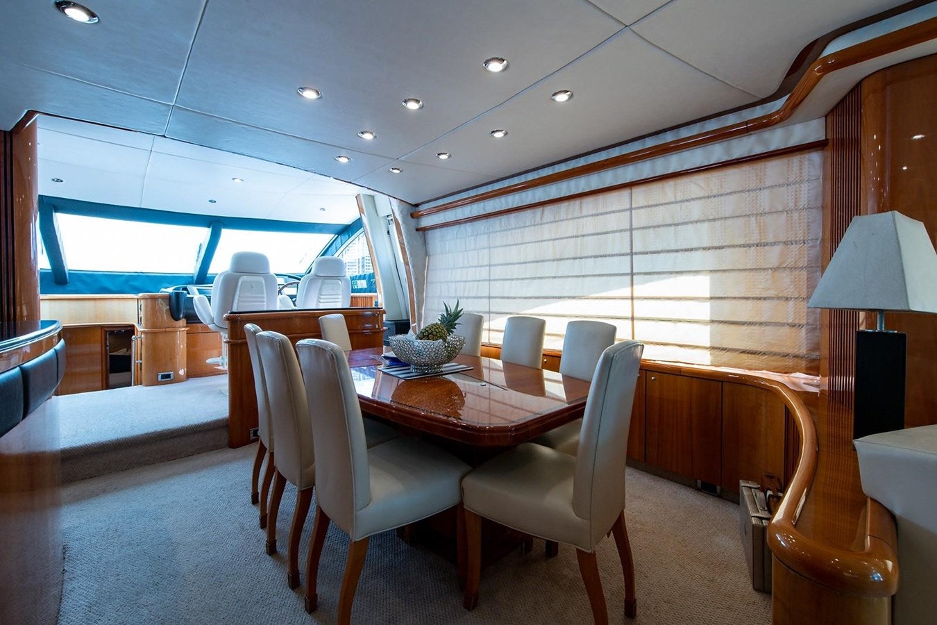a room with a table and chairs aboard 82 SUNSEEKER MANHATTAN  Yacht for Sale
