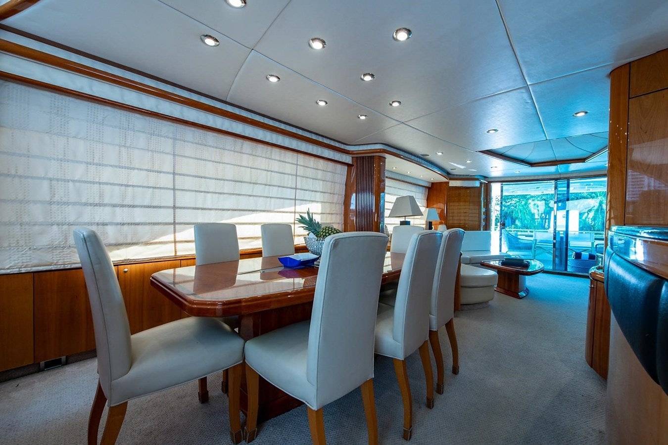 a room with tables and chairs aboard 82 SUNSEEKER MANHATTAN  Yacht for Sale