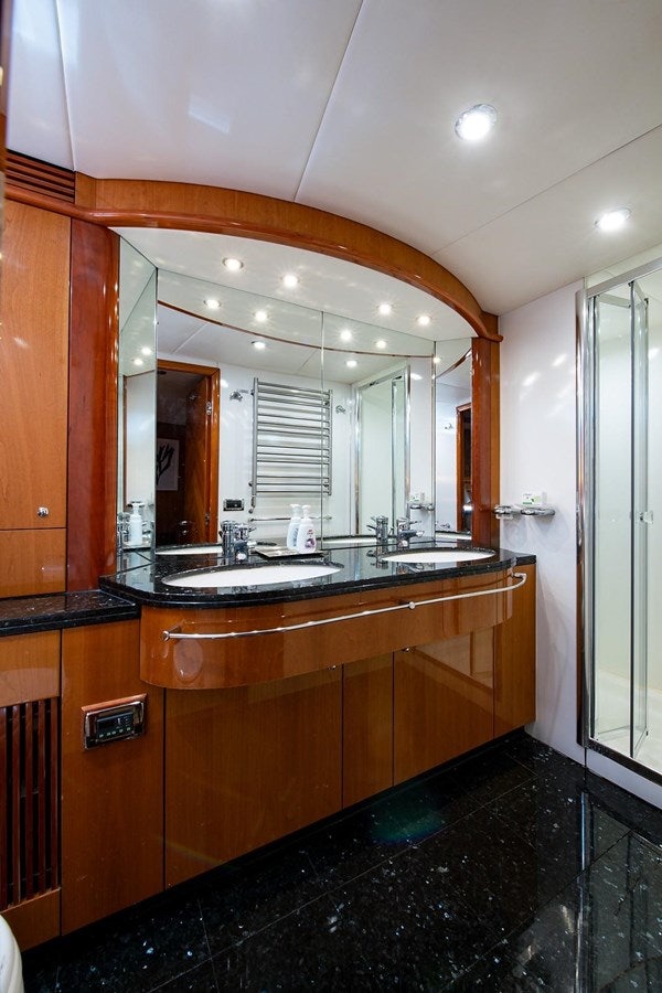 a bathroom with a large mirror aboard 82 SUNSEEKER MANHATTAN  Yacht for Sale