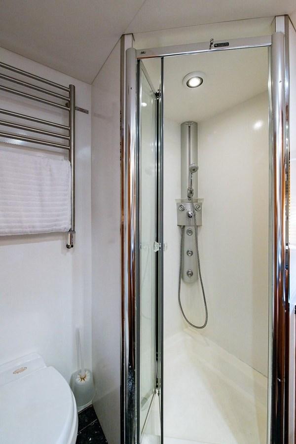 a bathroom with a shower unit aboard 82 SUNSEEKER MANHATTAN  Yacht for Sale