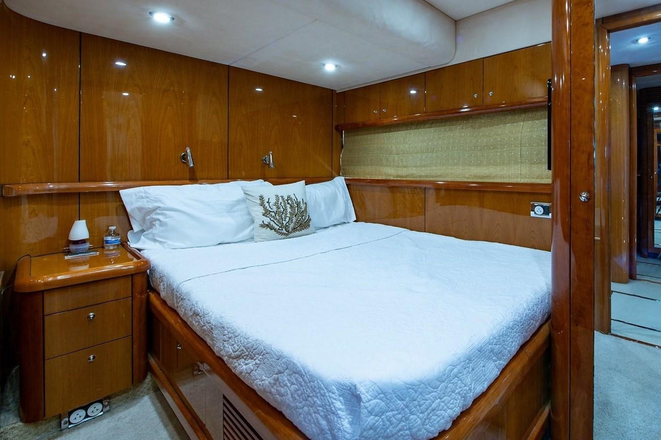 a bed in a cabin aboard 82 SUNSEEKER MANHATTAN  Yacht for Sale