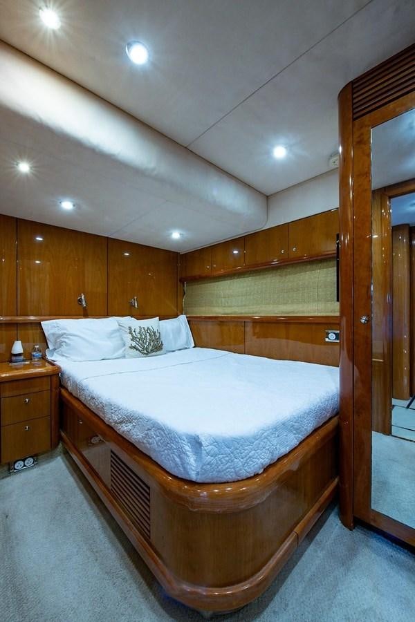 a bed in a room aboard 82 SUNSEEKER MANHATTAN  Yacht for Sale