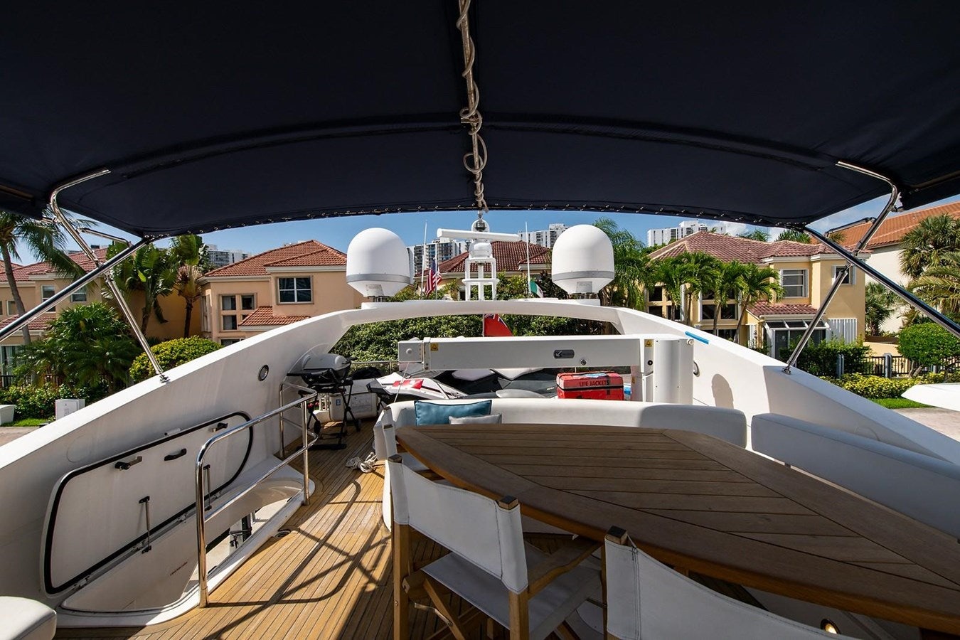 a table on a deck aboard 82 SUNSEEKER MANHATTAN  Yacht for Sale