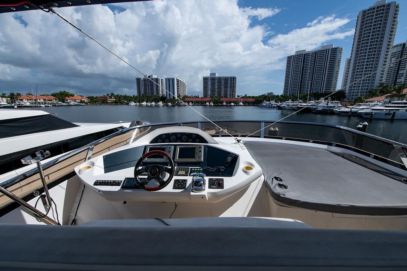 a boat in a harbor aboard 82 SUNSEEKER MANHATTAN  Yacht for Sale