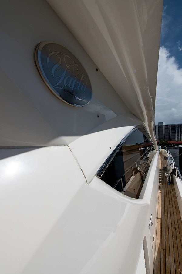 a white car with a round emblem on the roof aboard 82 SUNSEEKER MANHATTAN  Yacht for Sale