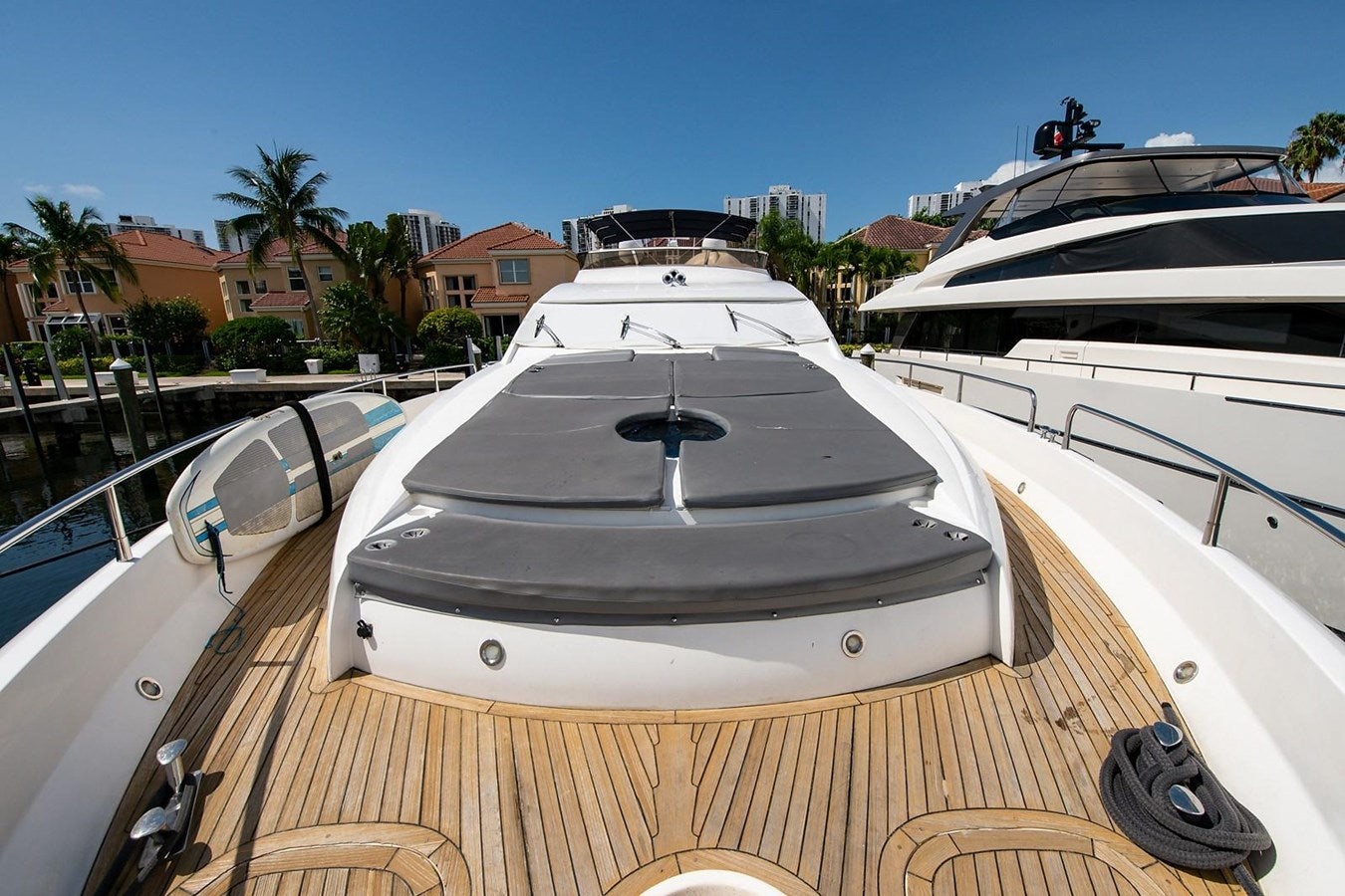 a deck with a white boat and a white boat on it aboard 82 SUNSEEKER MANHATTAN  Yacht for Sale